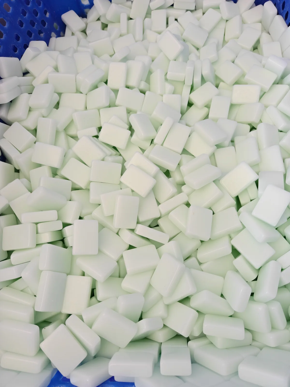Light green and white acrylic Mahjong tile blanks in production