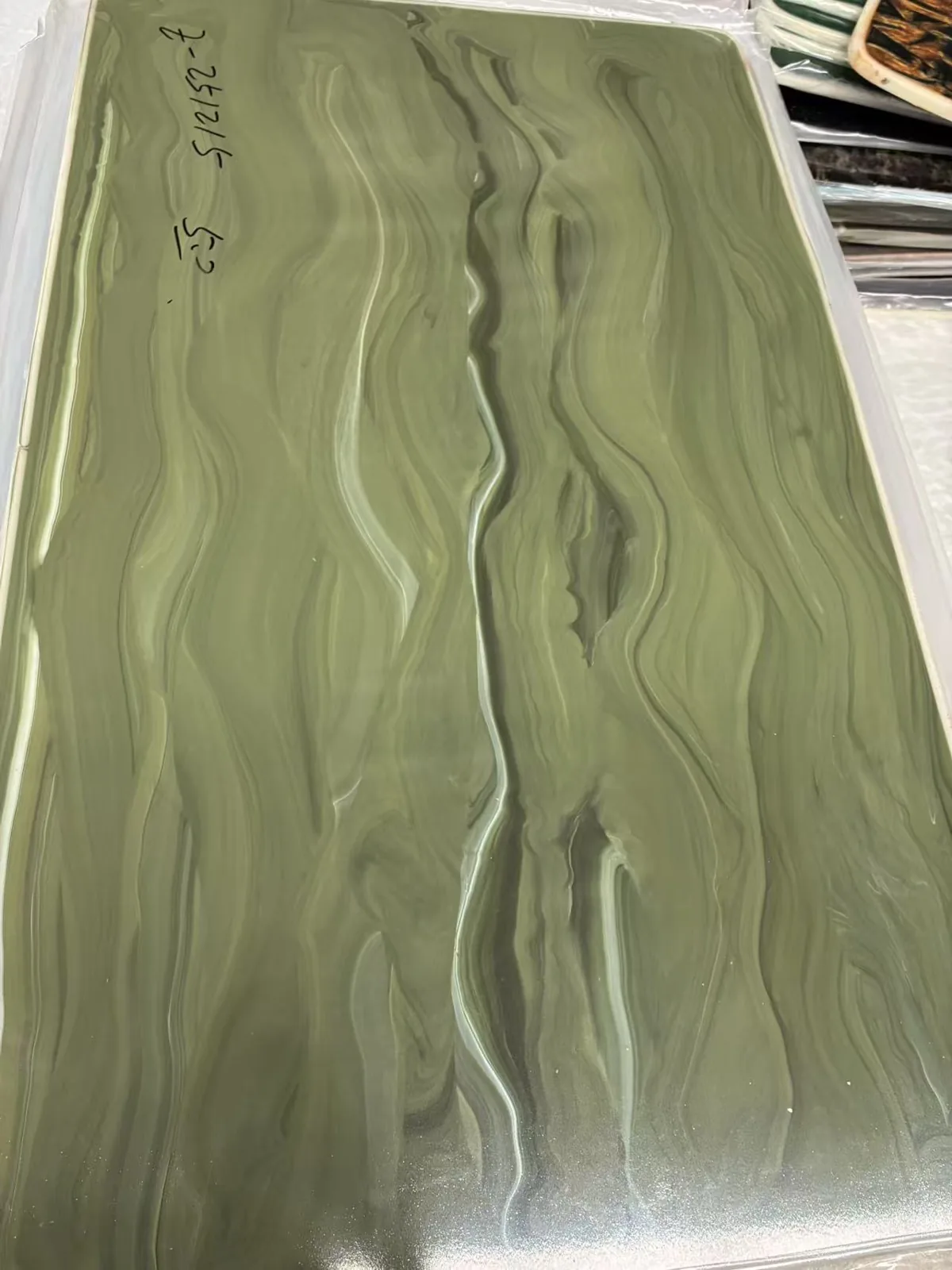 Olive green flowing-pattern acrylic sheet
