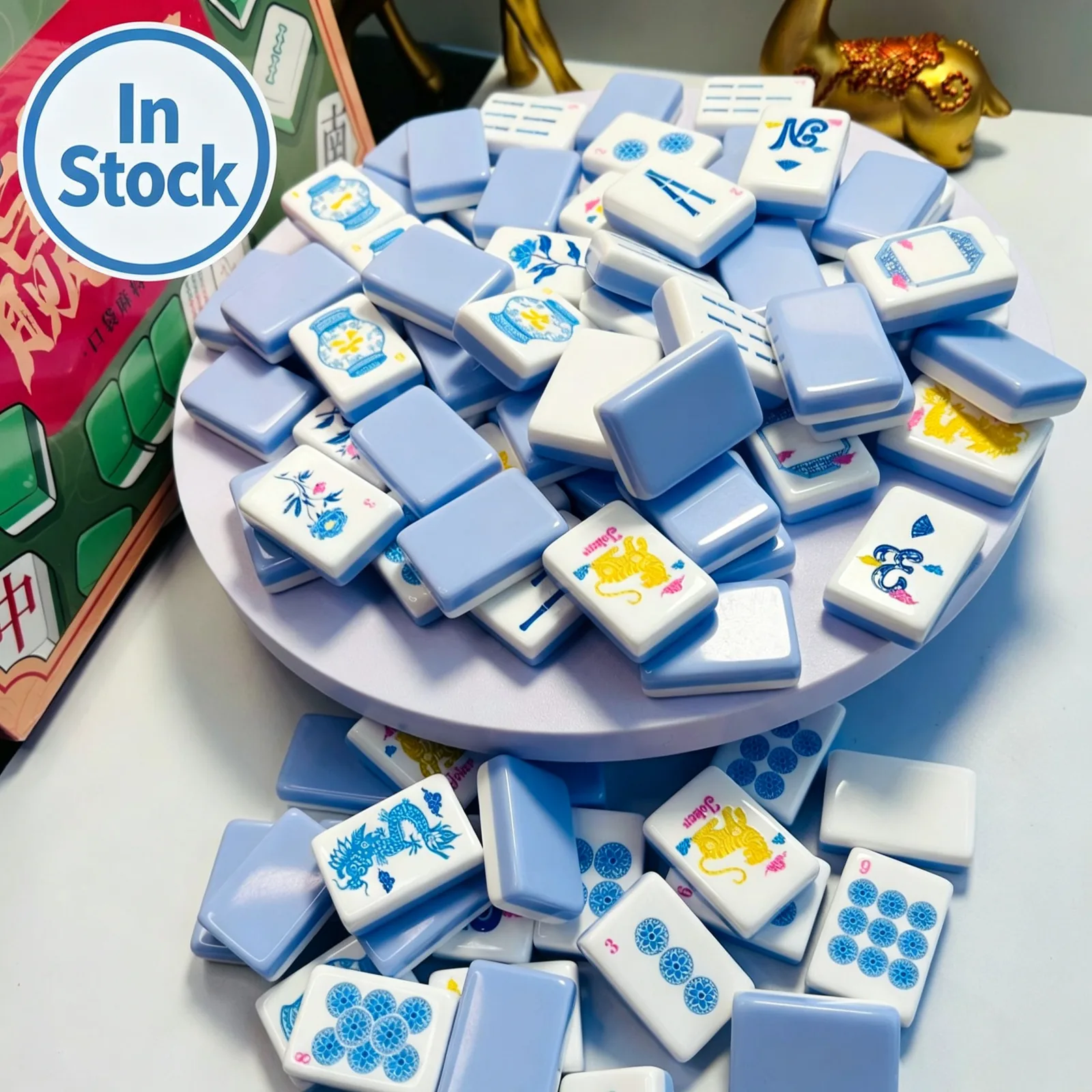 Blue and white Mahjong tiles on display